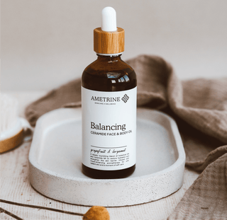 Ametrine Balancing Face and Body Oil bottle with ceramide NP and jojoba